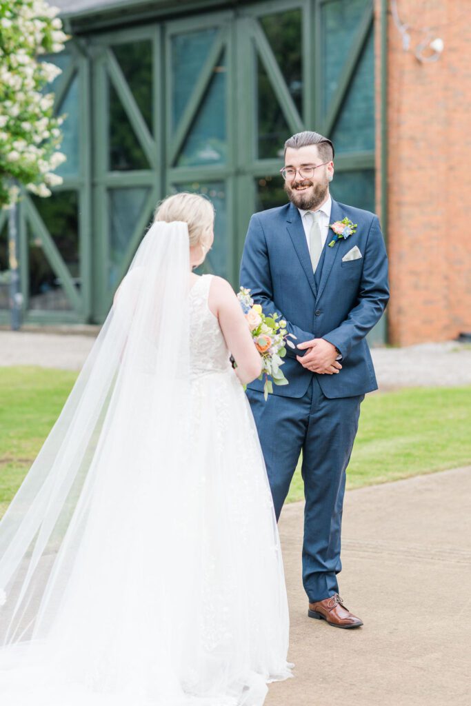 Roundhouse Wedding Venue in Huntsville, AL - bride and groom first look